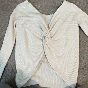 Pink Rose; off white sweater with semi open back; worn only once